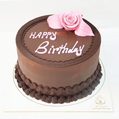 کیک خامه ای شکلاتی و  گل صورتی