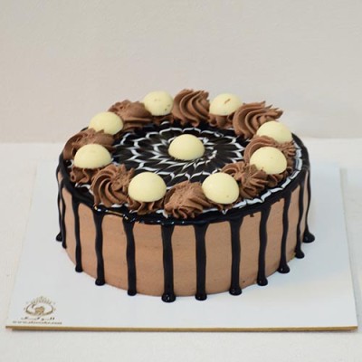 کیک خامه ای شکلاتی توپک 