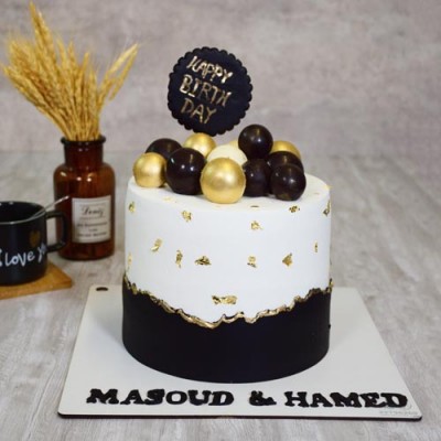 کیک مردانه مشکی و طلایی